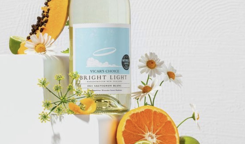 Bright Light label styled with oranges and flowers.