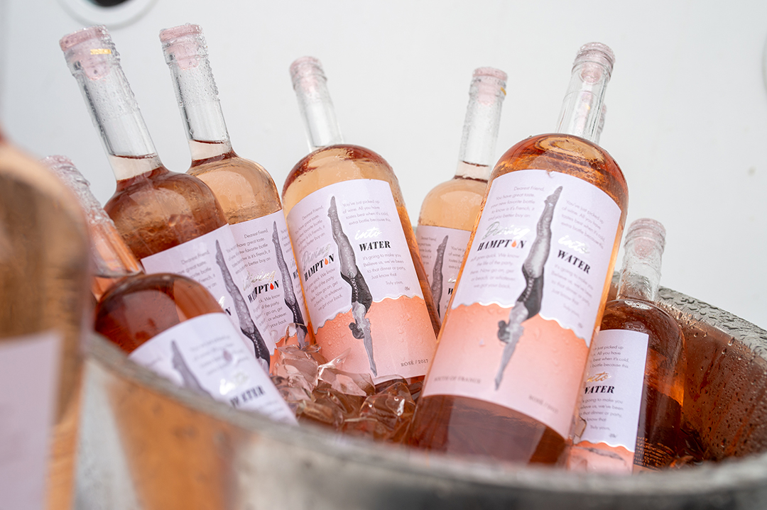 Bucket of Hampton Water's Rosé bottles.